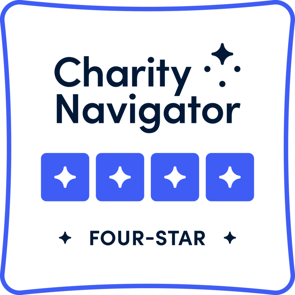 Charity Navigator Four-Star Rating Badge displaying four blue star icons, indicating the highest quality rating for charitable organizations.