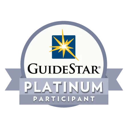 GuideStar Platinum Participant seal of transparency with gold starburst logo and blue ribbon banner